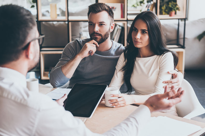 couple with business professionals